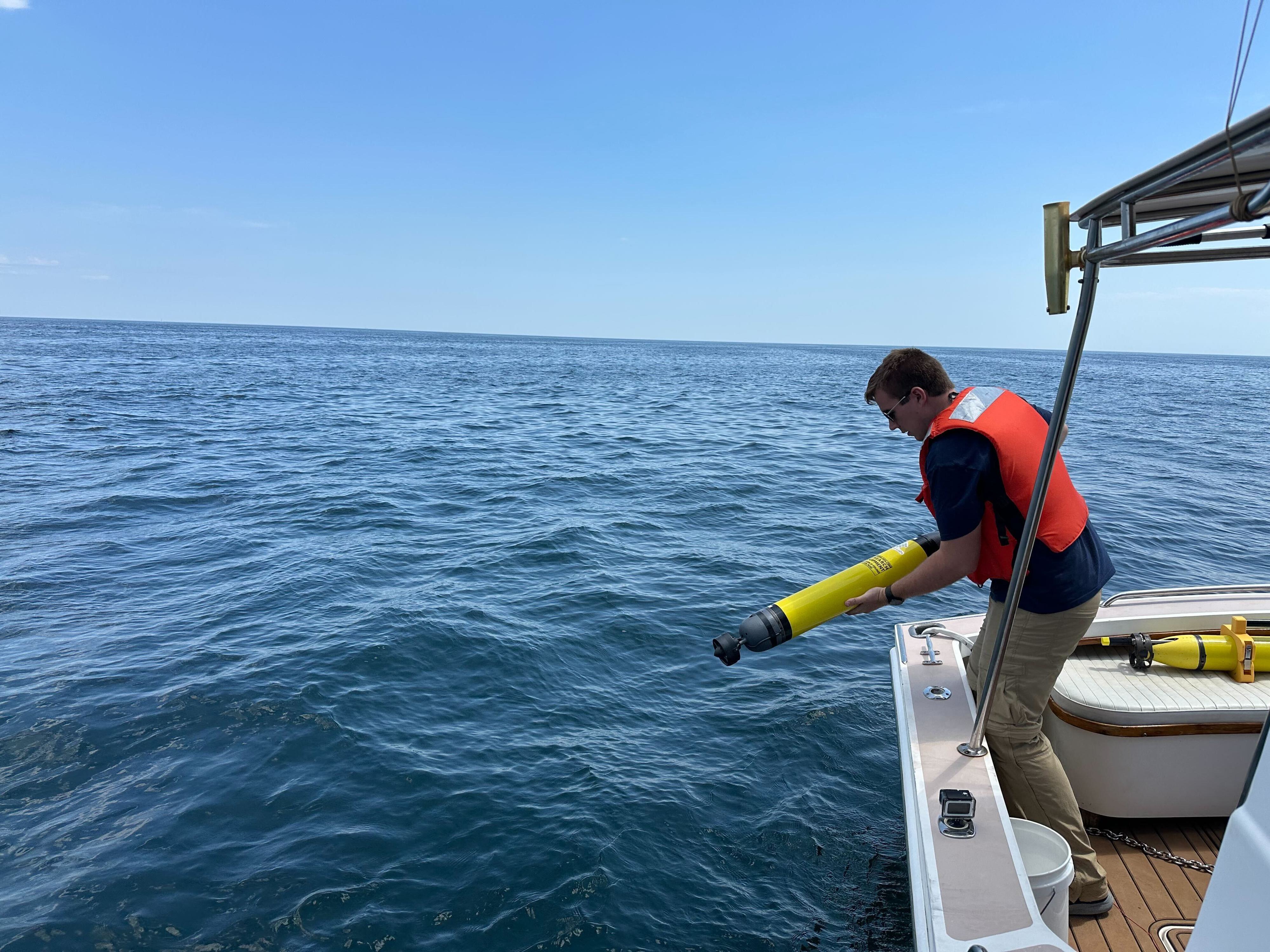 A man on a boat at sea