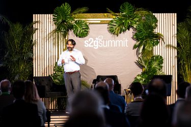 Sanjeev Krishnan speaking onstage at the S2G Summit