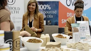Women working at the Big Bold Health booth
