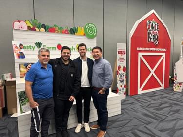 S2G team members at the Once Upon a Farm booth