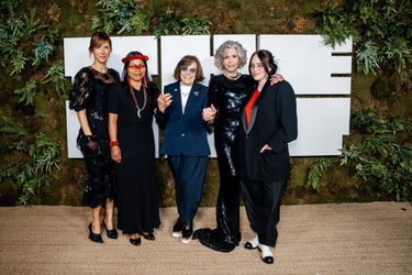 Women standing on stage