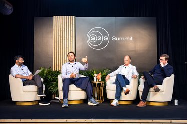 Men Speaking on Stage