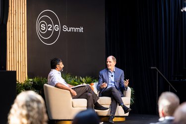 Men Speaking on Stage