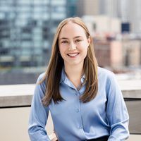 A woman smiling.Caroline Hogan.